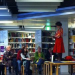 The writer in the red dress